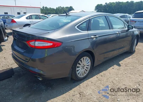 2015 Ford Fusion Energi Titanium from USA, damaged, VIN 3FA6P0SU1FR206433